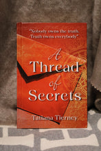 Load image into Gallery viewer, A Thread of Secrets by Tatiana Tierney Mrs Tea's Boutique and Bakery